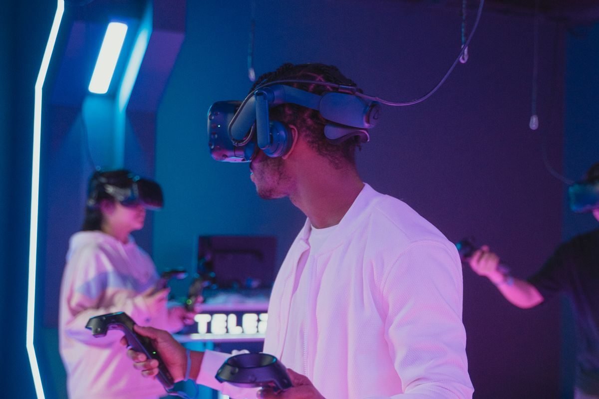 Two players in headsets using motion controllers