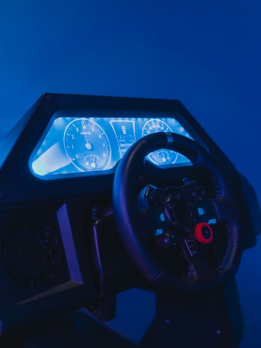 A commercial racing rig with force-feedback wheel and load-cell pedals